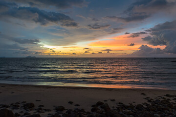 Obraz premium View to the South China Sea at sundown on the Damai beach in the Santubong national park in the north of the city Kuching on Borneo