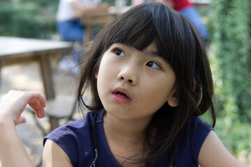 Portrait Asian cute child girl 7 years old
