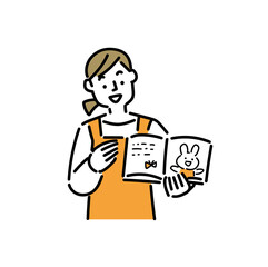 保育園で読み聞かせをする20代の女性保育士