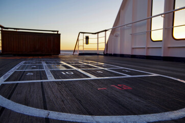 Pooldeck or swimmingpool with sun deck on modern Costa cruiseship or cruise ship liner with sun...