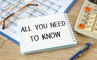 Notebook with text - All you need to know - near office supplies.