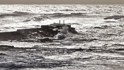 waves crashing on the rocks