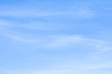 Blue sky background and white clouds soft focus, and copy space - 402136684
