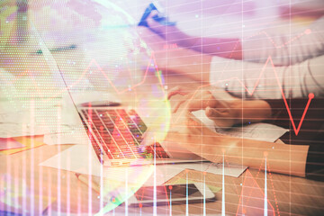 Multi exposure of woman hands typing on computer and financial chart hologram drawing. Stock market analysis concept.