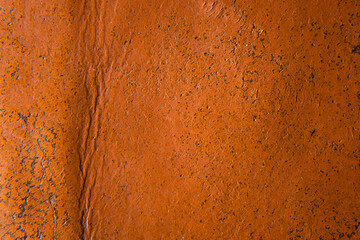 Close up of brown leather texture. Grunge skin fabric background.