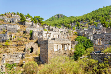Fototapeta na wymiar Ghost Town, Abandoned houses and ruins of Kayakoy village, Fethiye, Turkey