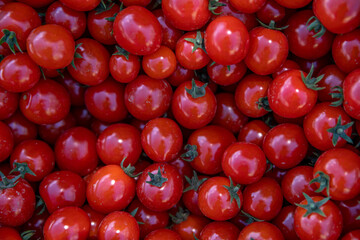 background from red ripe tomatoes grown without chemistry