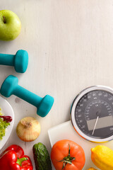 Healthy food and sport background with scale top vertical