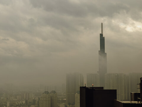 Cinematic Groomy, Cloudy, Foggy Landmark 81 building Vietnam city landscape.
