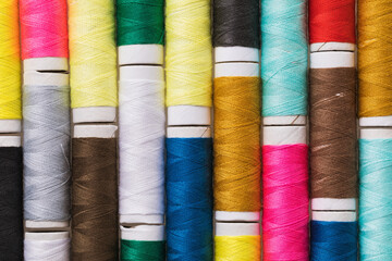Background from multi-colored spools of thread