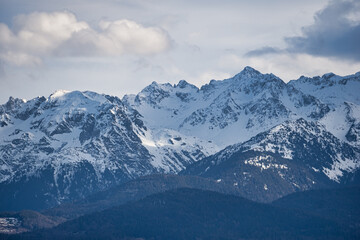 Fototapeta na wymiar Snowy alpine mountain scene