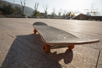 Skateboard outdoors on sunny morning