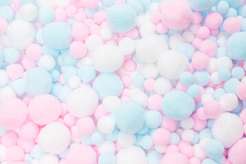 White, pink and blue soft pompons.