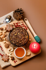 Kutia is a sweet wheat porridge of the Slavs. Traditional Christmas dish of the orthodox christians. Christmas kutia with honey, nuts, poppy, raisins and spices. Christmas eve food. Top view.