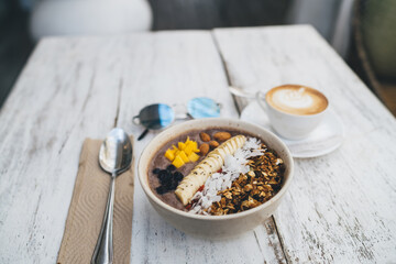 Served breakfast bowl on table in restaurant