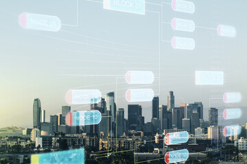 Multi exposure of abstract software development hologram on Los Angeles skyscrapers background, research and analytics concept