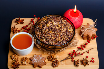 Christmas kutia with honey, walnuts, raisins and poppy. Christmas eve food. Christmas atmosphere.