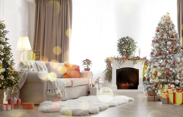 Festive living room interior with Christmas trees and fireplace