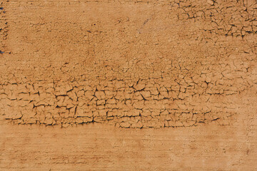 Fashionable brown background for an ad or advertisement. An empty surface with a cracked texture