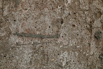 Abstract cement background with grunge rock wall. Monochrome texture. Image includes a effect the black and white tones.