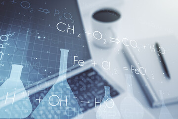Creative chemistry concept on modern laptop background. Multiexposure