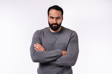 Fototapeta premium Angry handsome Arab man in casual attire isolated over white background