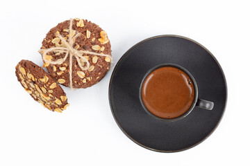 delicious cookies and a cup of coffee. Isolated on white background