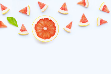 High vitamin C. Juicy grapefruit slices on white.