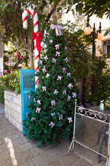 Fototapeta na wymiar Decorated for the celebration of Christmas Sderot Ben Gurion Street in the Haifa city in northern Israel