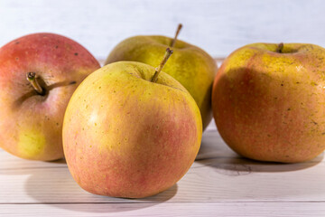 green apples in a white table