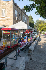 A street shop selling drinks, popcorn and toys for children on Sderot Ben Gurion Street in the city of Haifa in northern Israel