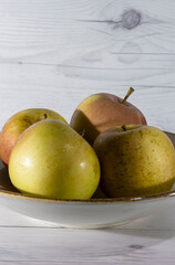 green apples in a white table