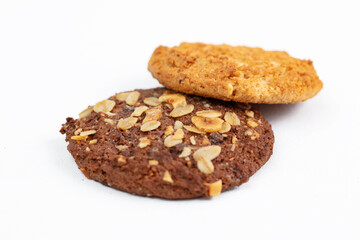 Homemade chocolate chip and oatmeal cookies isolated on white background.