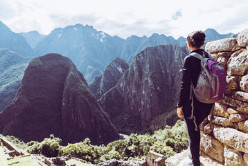 Traveller admiring amazing mountain views in Peru.