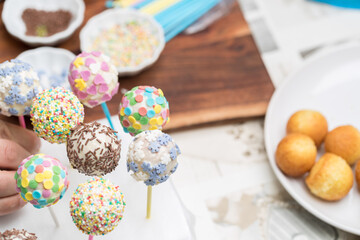 Chocolate cake pops with sprinkles