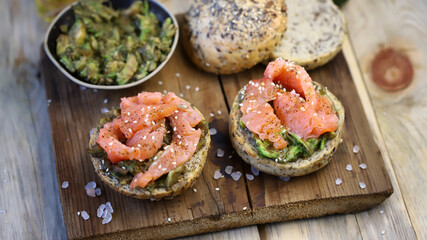 Selective focus. Salmon sandwiches with avocado. Healthy snack. The keto diet.