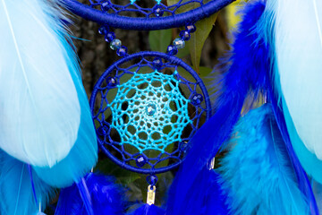 Handmade dream catcher with feathers threads and beads rope hanging