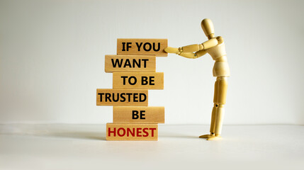 Be honest symbol. Wooden blocks with words 'If you want to be trusted be honest'. Wooden model of...