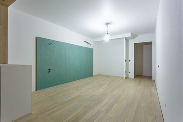 Empty unfurnished room with minimal preparatory repairs. interior with white walls