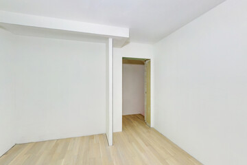 Empty unfurnished room with minimal preparatory repairs. interior with white walls