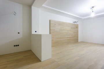 Empty unfurnished room with minimal preparatory repairs. interior with white walls