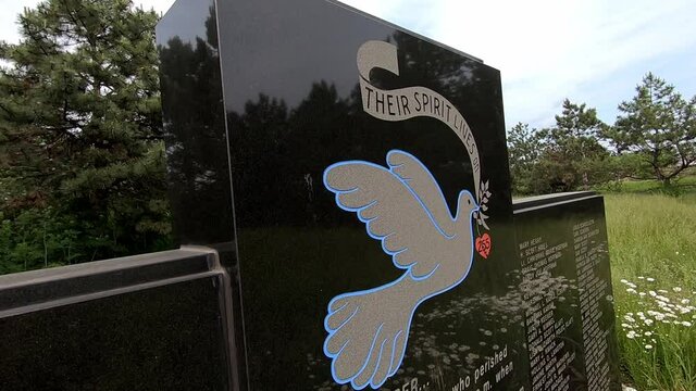 Details Of Northwest Airlines Flight 255 Memorial With List Of Victims On Black Granite In Detroit Metropolitan Authority, Romulus, Michigan - close up, slow tilt down