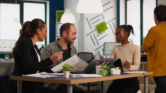 Nervous businessman quarrelling in coworking space, having conflict at workplace blaming accuses for bad work incompetence mistakes. Reprimanding unsuccessful results and rivalry concept.