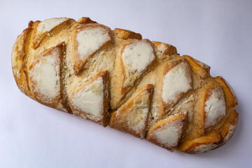 Traditional Italian baguette bread on white background