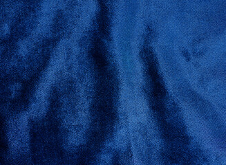 classic blue velvet fabric for background. abstract wavy shiny fabric for luxury concept...