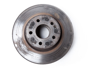 Pair of old brake discs covered with rust on a white isolated background in a photography studio. Seasonal repair of suspension and brake system in workshop or sale of spare parts for auto analysis.