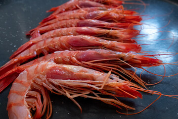 Raw and fresh red prawns ready to be grilled