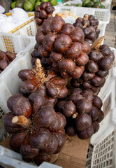 a photo of a pile of salak fruit