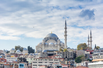 Fototapeta na wymiar Cityscape of bank of bosphorus strait in Istanbul with Suleymaniye mosque, which is an Ottoman imperial mosque located on the Third Hill of Istanbul, Turkey