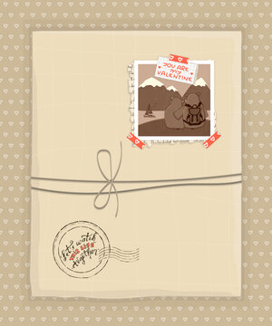 Gift in craft paper. There is old archive retro photo of two hippos in mountains on present top with washi tape, newspaper and You are my Valentine text, old hand drawn stamp